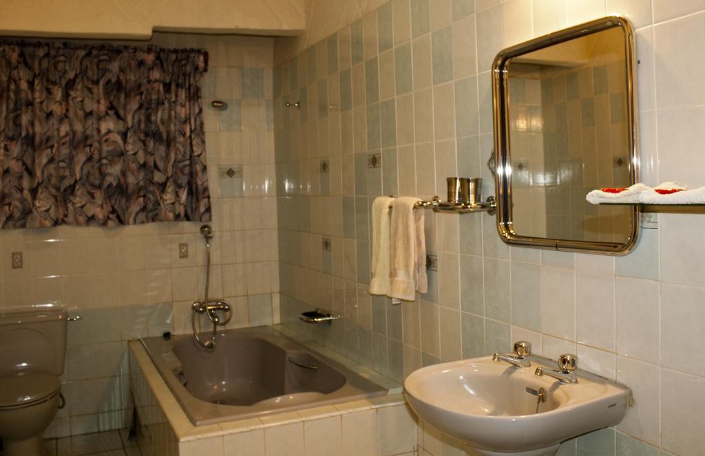 Four Villages Inn Kumasi Chambre photo